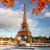 Eiffel Tower with autumn leaves in Paris, France.jpg