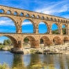 Pont du Gard is an old Roman aqueduct near Nimes in Southern France.jpg